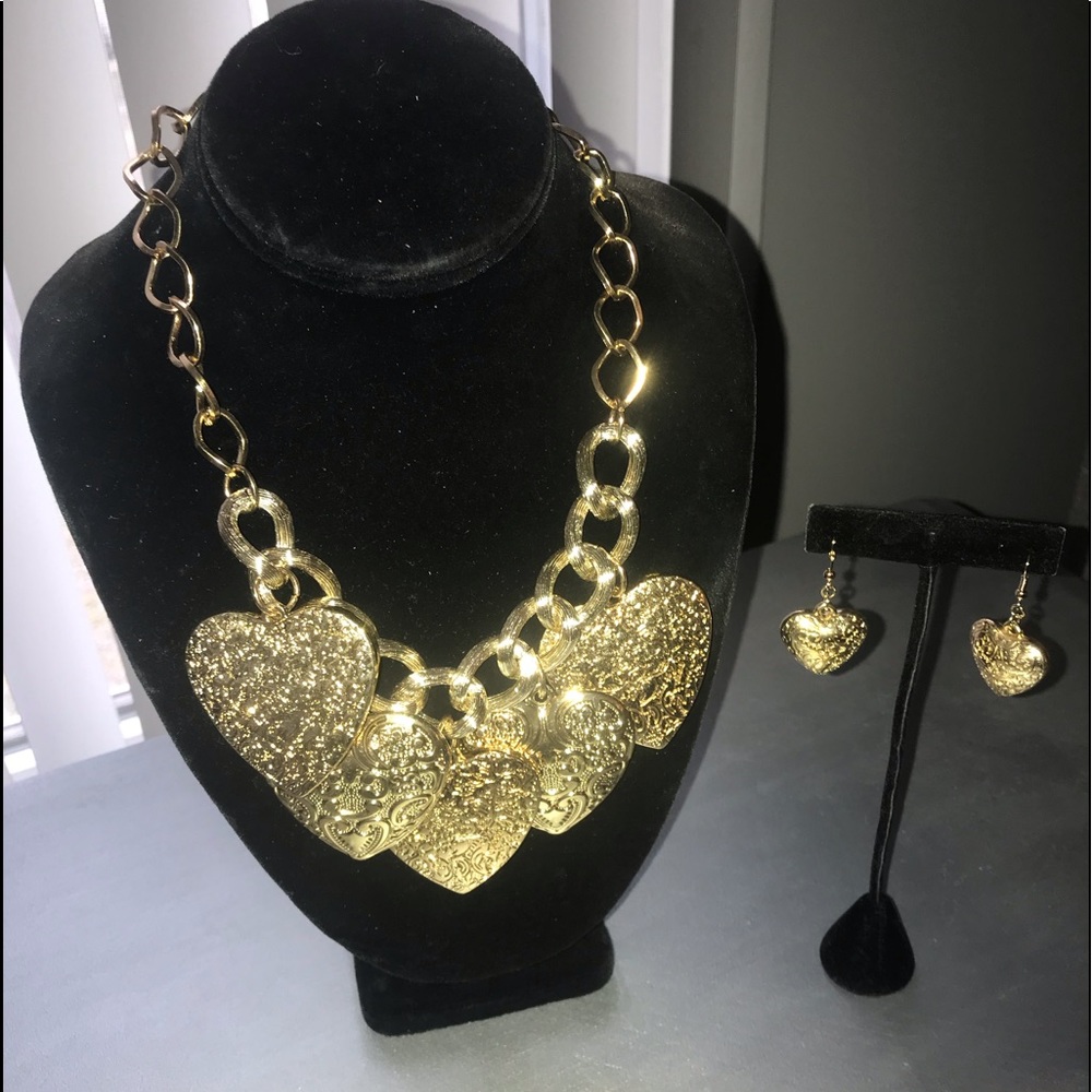 Beautiful gold heart charmed necklace and earrings